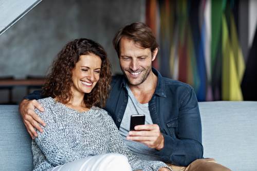 Couple using mobile banking